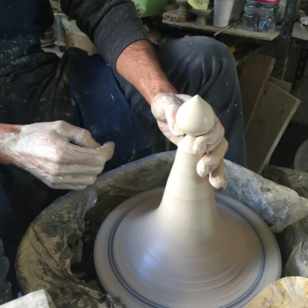 A pumo being shaped on the potter wheel in Puglia