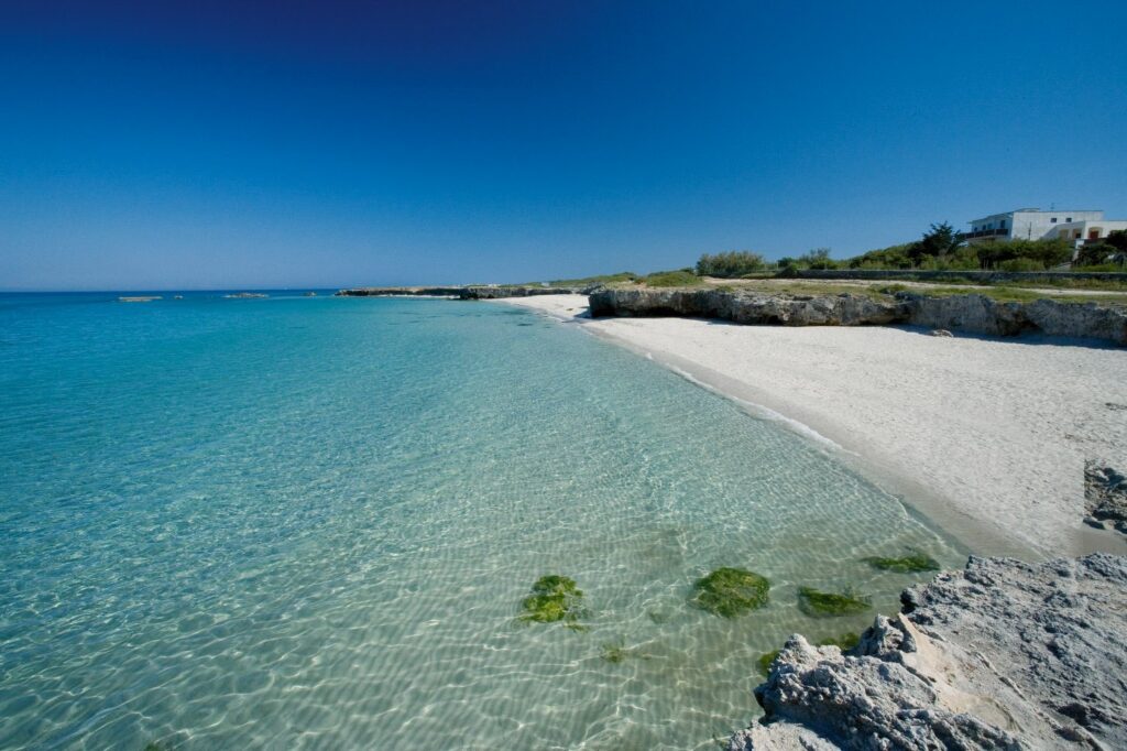 Clear water and pale sand on the Salento coast