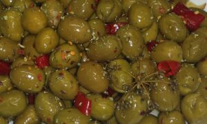 Cracked green olives dressed with red chilli, oregano and wild fennel seeds