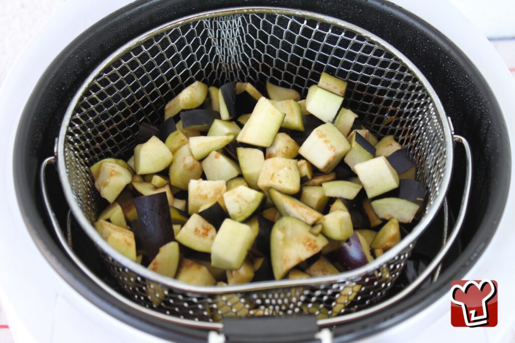 Apulian caponata of fried diced vegetables in a serving bowl