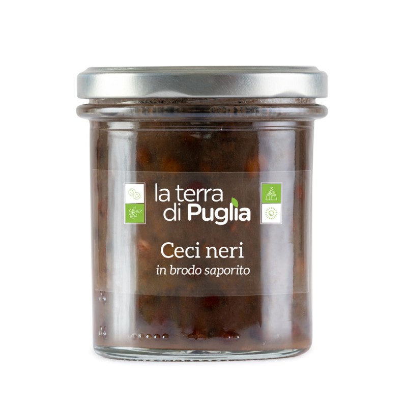 A glass jar of black chickpeas in broth with the La Terra di Puglia label